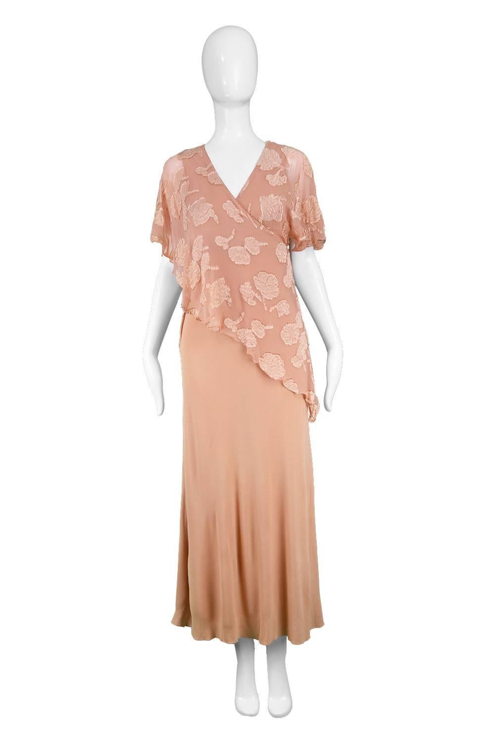 Janice Wainwright Peach Devore Chiffon & Jersey Asymmetric Maxi Dress, 1970s

Estimated Size: UK 8-10/ US 4-6/ EU 36-38. Please check measurements.
Bust - Stretches up to 34” / 86cm
Waist - 28” / 71cm
Hips - Up to 40” / 101cm
Length (Shoulder to