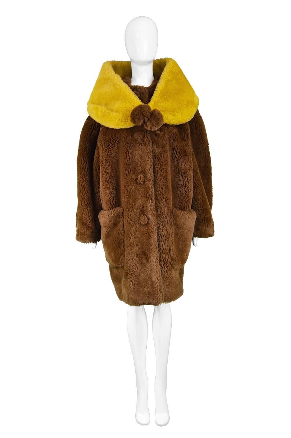 Jean Paul Gaultier Dramatic Brown Faux Fur Swing Coat with Wrap Stole, 1980s

Size: Marked 46 which is roughly a women's Large but this is meant to have a very oversized fit. 
Bust - Up to 50” / 127cm
Waist - 52” / 132cm
Hips - 52” / 132cm
Length