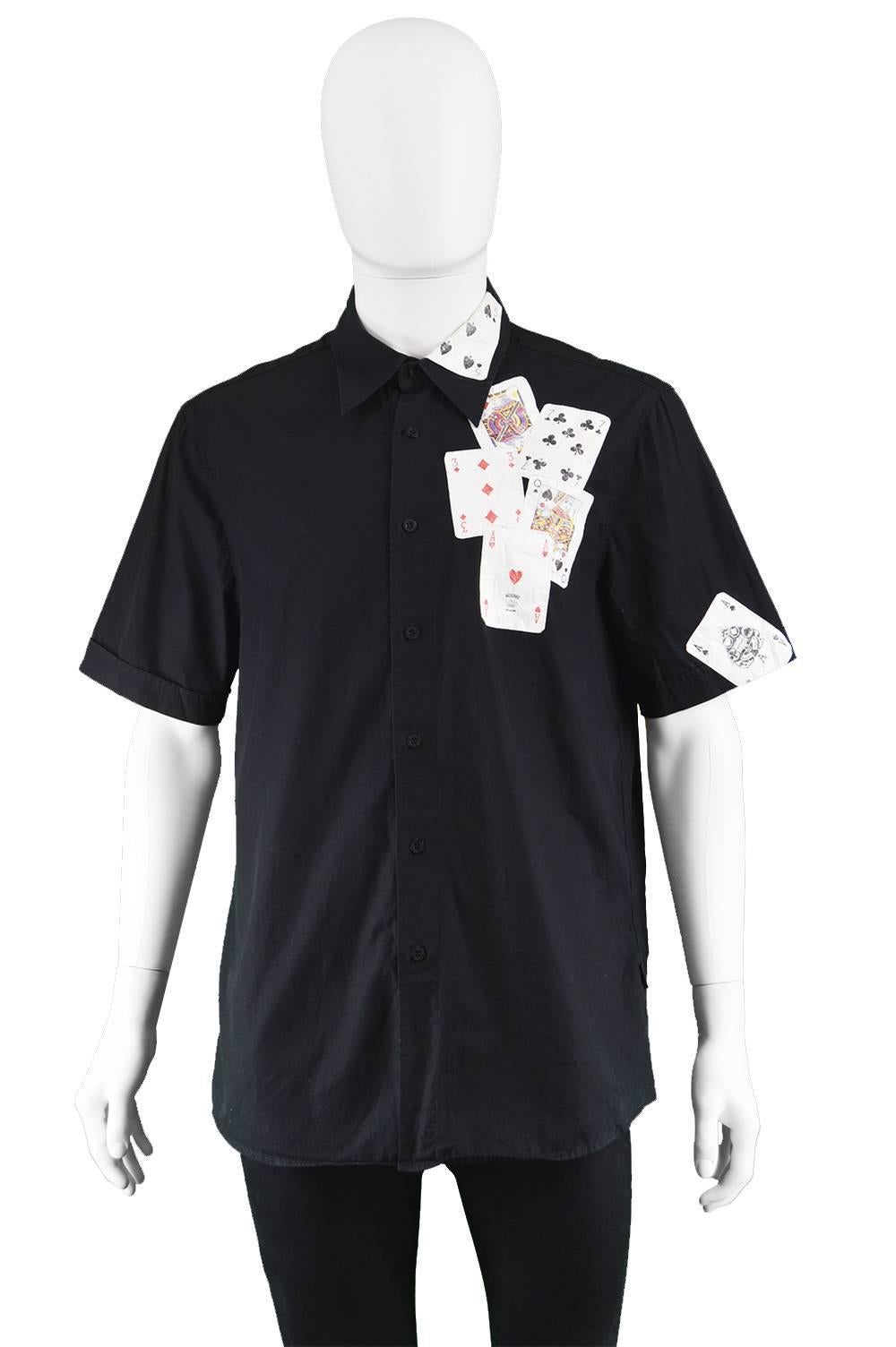 Moschino Men's Black Cotton Playing Card Short Sleeve Shirt

Size: Marked L
Chest - 42” / 106cm
Length (Shoulder to Hem) - 27” / 68cm
Shoulder to Shoulder - 19” / 48cm
Sleeve Pit to Cuff - 5” / 12cm
Sleeve Shoulder to Cuff - 10” / 25cm

Condition: