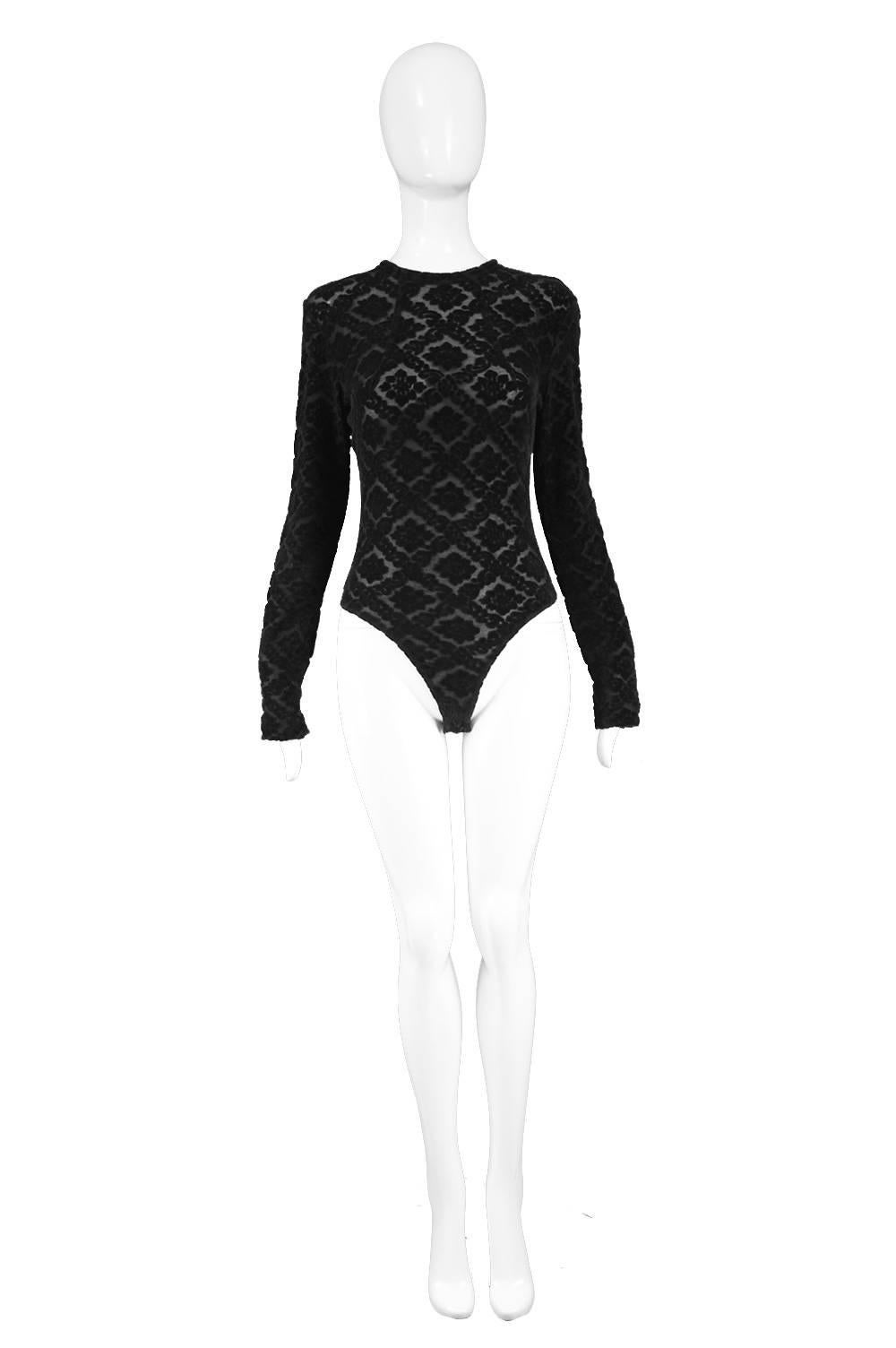 Rifat Ozbek Black Semi Sheer Devore Velvet Long Sleeve Bodysuit, 1990s

Estimated Size: UK 10-12/ US 6-8/ EU 38-40. Please check measurements (especially sleeve measurements as they are quite long).
Bust - Stretches from 34-38” / 86-96cm
Waist -