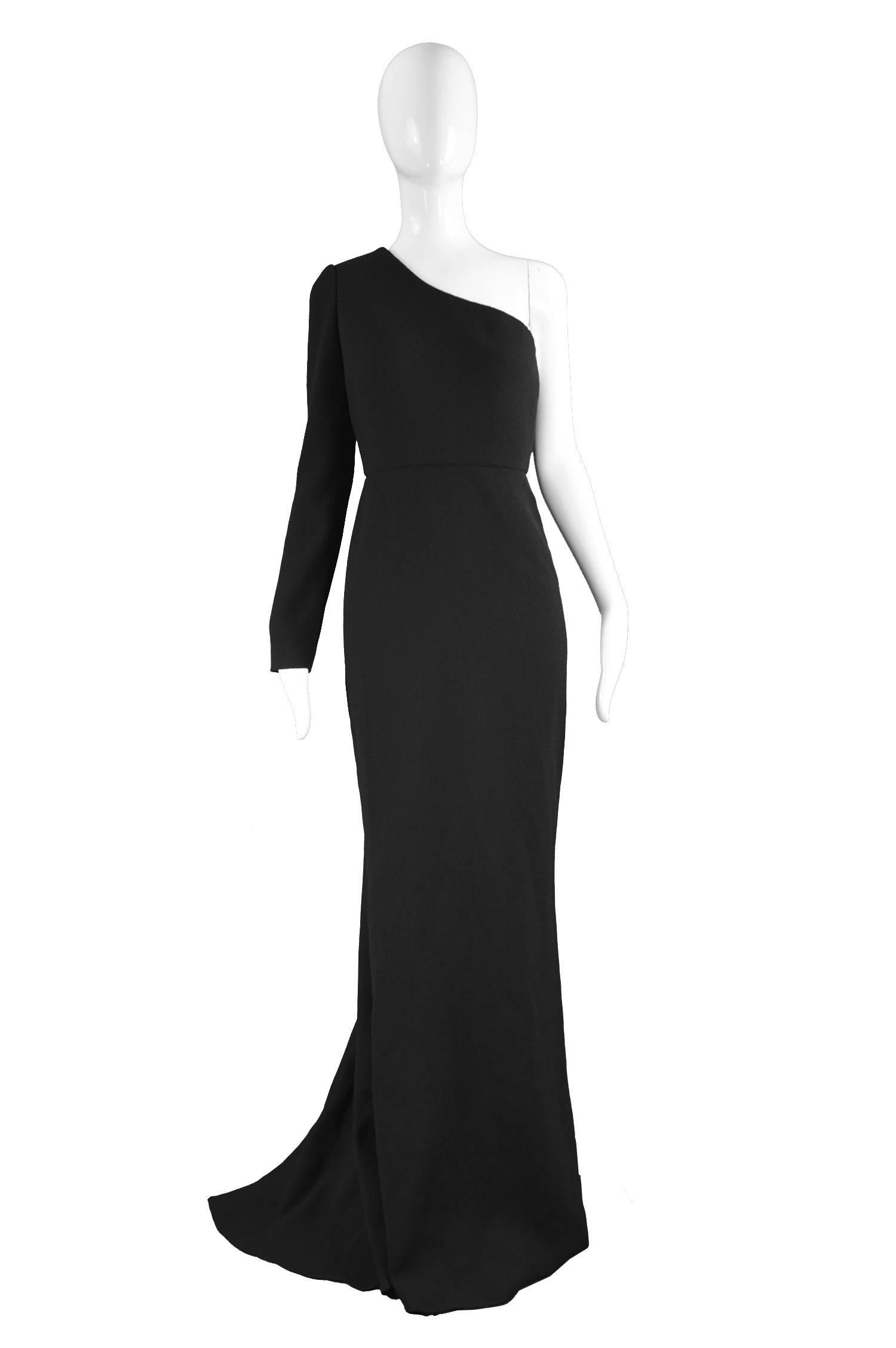 Unworn Calvin Klein Collection One Shoulder Black Wool Evening Gown

Size: Marked US 4 / IT 40 but fits most like a UK 8-10/ US 4-6 / EU 38-40. Please check measurements
Bust - 34” / 86cm
Waist - 26” / 66cm
Hips - up to 38” / 96cm
Length (Shoulder