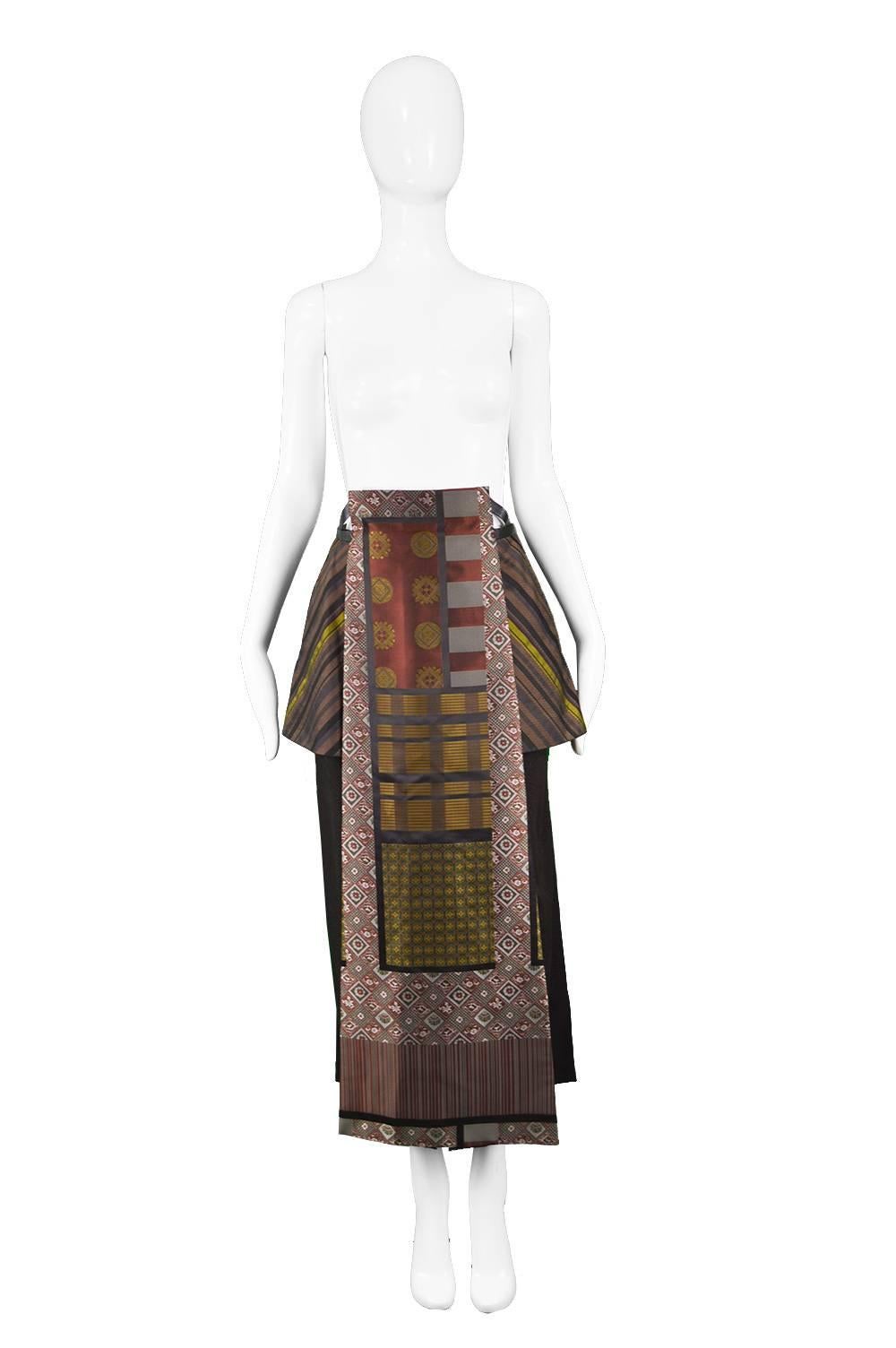 Kenzo Vintage Silk Blend Asian Panelled Brocade Avant Garde Maxi Skirt, 1990s 

Estimated Size: UK 8/ US 4/ EU 36. Please check measurements.
Waist - 26” / 66cm
Hips - 36” / 91cm
Length (Waist to Hem) - 35” / 89cm

Condition: Excellent Vintage