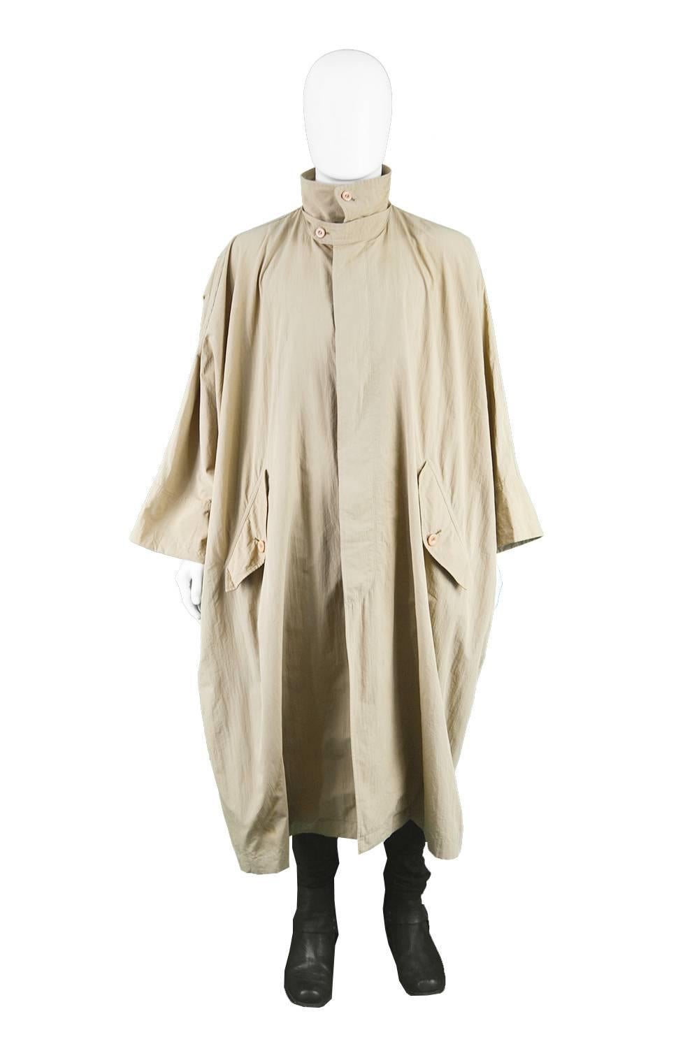 Issey Miyake Rare Vintage Oversized Khaki Lightweight Windcoat, 1980s

Size: Marked M but fits from Small to Large due to intentional oversized fit.
Bust - Free
Waist - Free
Length (Shoulder to Hem) - 49” / 129cm

Condition: Very good Vintage