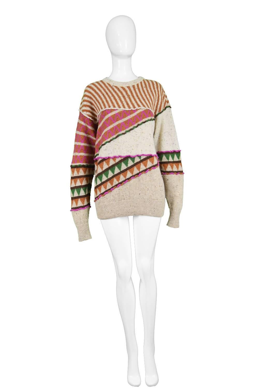 Issey Miyake Vintage 1980s Intarsia Knit Textured Oversize Wool Tribal Jumper

Size: Marked Japanese M but would also suit a women's Small with the intentional loose, slouchy fit
Bust - 40” / 101cm
Waist - 34” / 86cm
Length (Shoulder to Hem) - 26” /