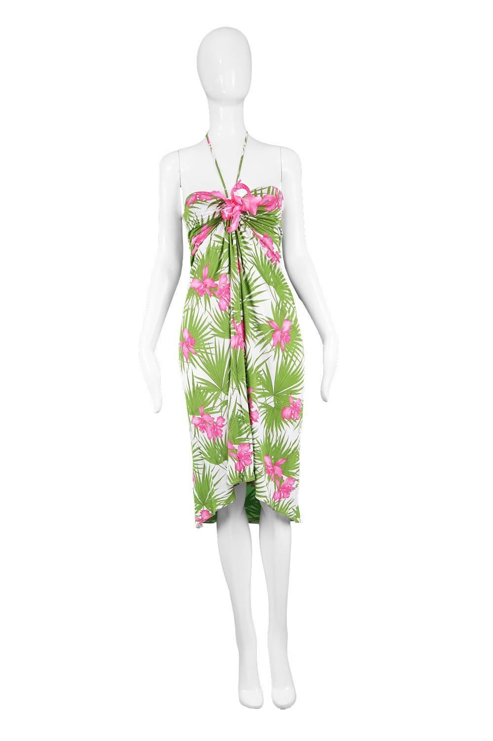 Celine by Michael Kors White Jersey Tropical Halter Dress, S/S 2004

Size: Marked EU 38 which is roughly a UK 10/ US 6. Please check measurements.
Bust - 34” / 86cm
Waist - 28”  / 71cm
Hips - Up to 44” / 112cm
Length (Bust to Hem) - 35” /