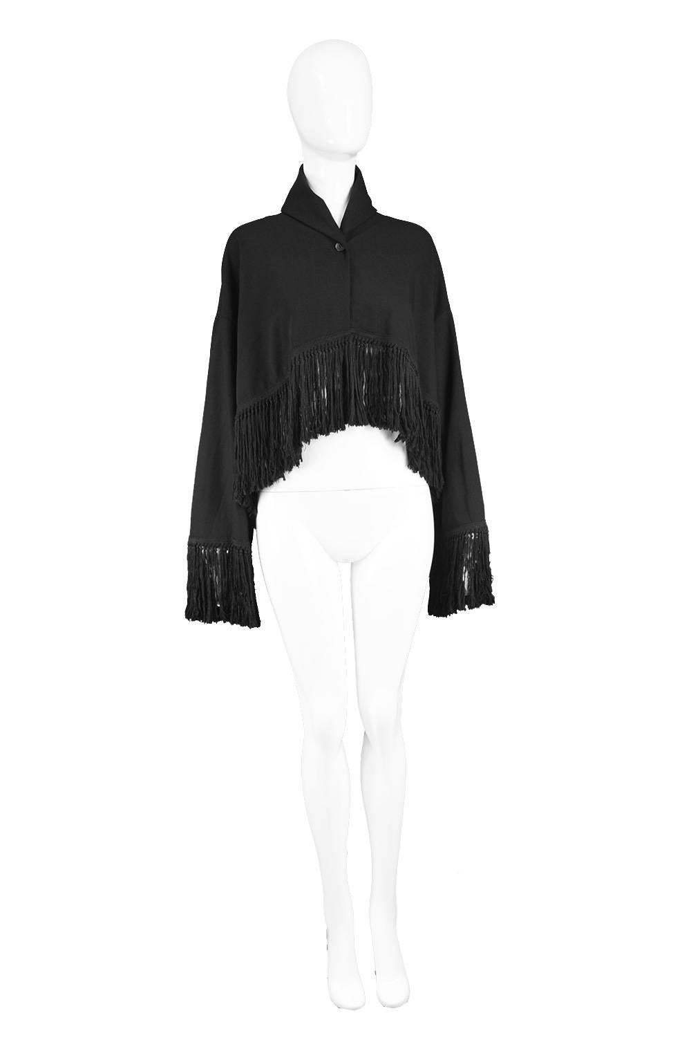 Romeo Gigli for Callaghan Knotted Fringe Black Stretch Wool Jacket, 1990s 

Size: Marked EU 40 which is roughly a UK 12/ US 8 but would fit a Small to Large due to oversized cape style fit. 
Bust - Free
Waist - Free
Length (Front) - 17” /