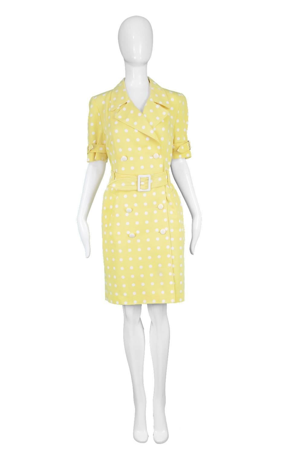 Escada Vintage Yellow & White Polka Dot Short Sleeve Trenchcoat Dress, 1980s

Estimated Size: UK 14-16/ US 10-12/ EU 42-44. Please check measurements. 
Bust - 40” / 101cm
Waist - 34” / 86cm
Hips - 38” / 96cm
Length (Shoulder to Hem) - 37” 