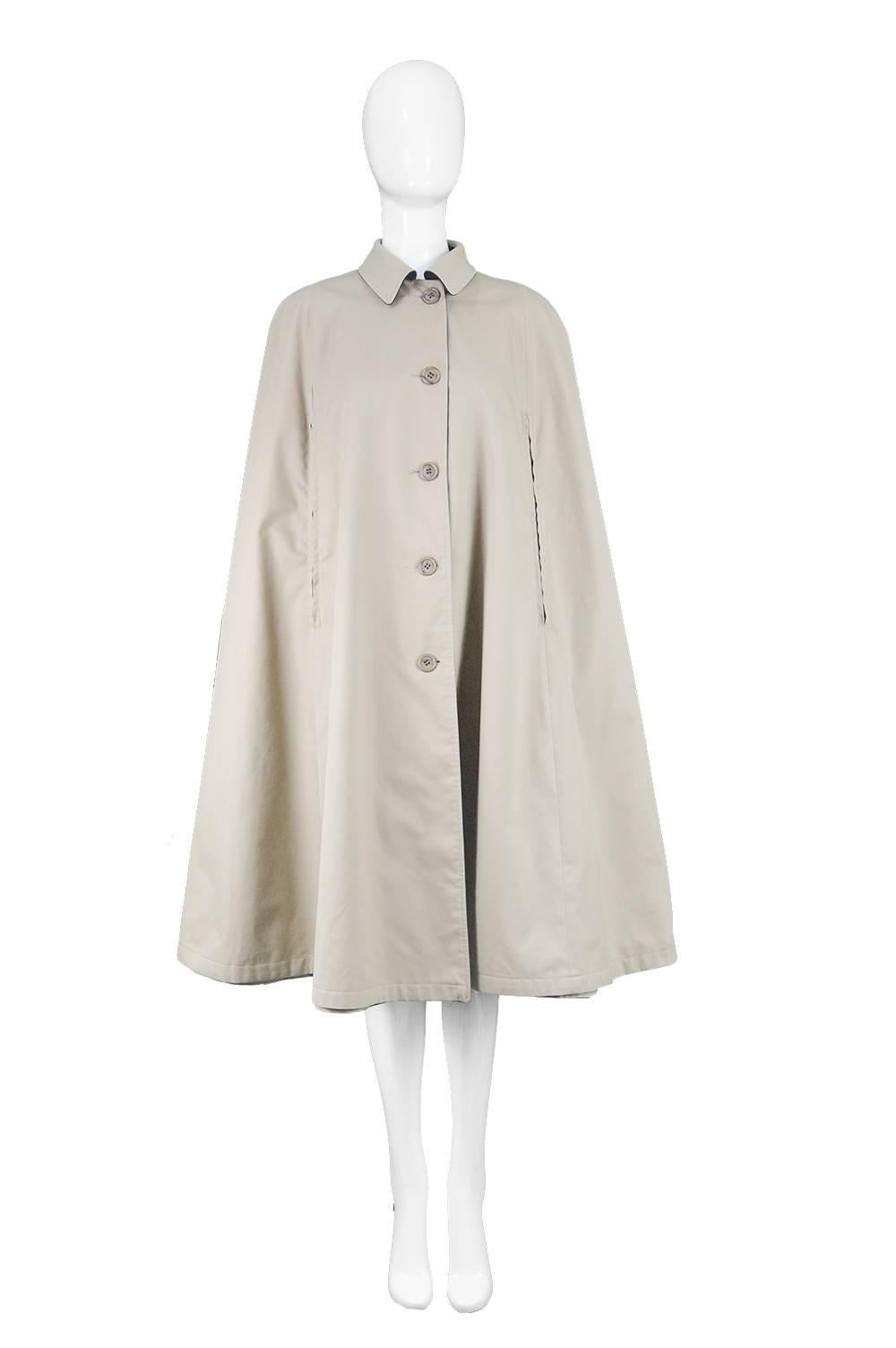 Burberry Vintage 1960s Reversible Trenchcoat Gabardine & Wool Plaid Cloak 

Size: One size fits most.
Bust -Free
Waist - Free
Length (Shoulder to Hem) - 42” / 106cm
Shoulder to Shoulder - 17” / 43cm

Condition: Excellent Vintage Condition - Small