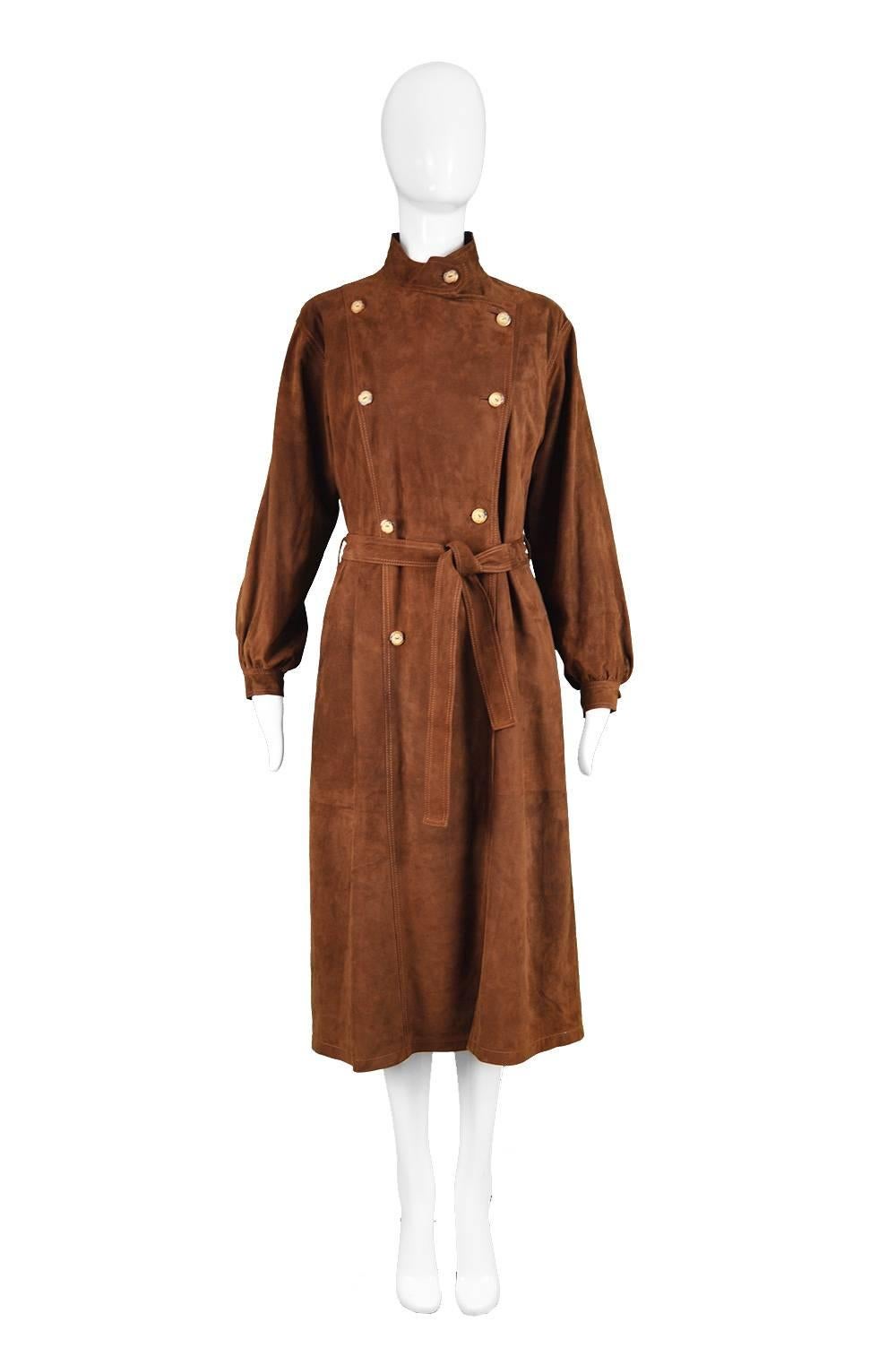 Loewe Vintage Brown Suede Double Breasted Shirtdress, 1980s

Estimated Size: UK 14/ US 10/ EU 42. Please check measurements. 
Bust - 38” / 96cm
Waist - 40” / 101cm (can be pulled in with belt
Hips - 42” / 106cm
Length (Shoulder to Hem) - 45” /