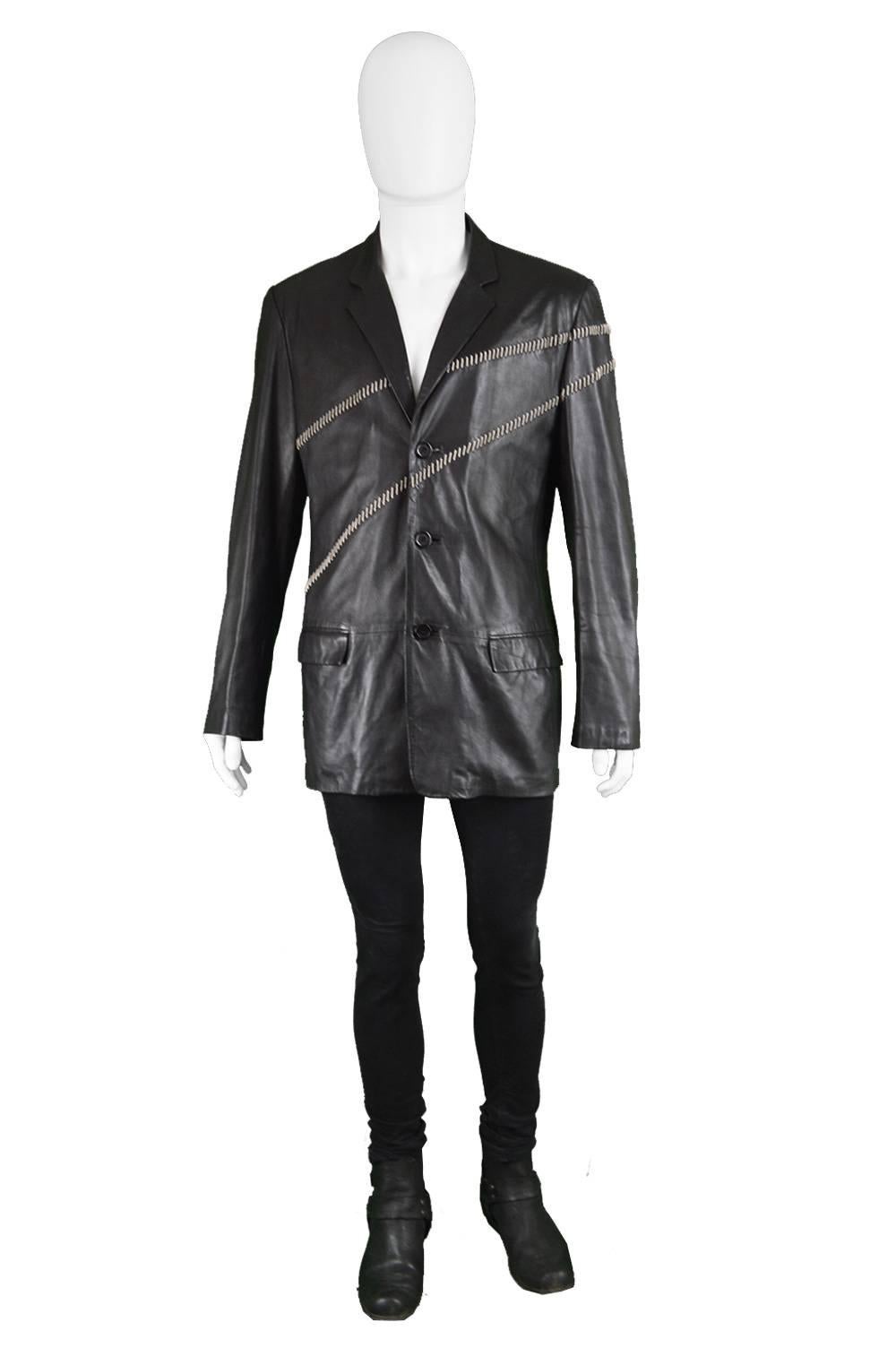 Gianni Versace Vintage Men's Leather Chain Embroidered Blazer Jacket, 1990s

Size: Marked EU 50 which is roughly a men's Medium. Please check measurements.
Chest - 42” / 106cm (allow a couple of inches room for movement)
Waist - 38” / 96cm
Length