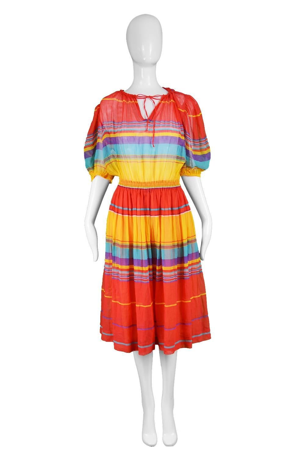 Céline Paris Vintage Brightly Multicoloured Cotton Gauze Striped Peasant Dress, 1970s

Size: best fits a women's Medium as elasticated cuffs are quite wide and bust is meant to be worn loosely. Please check measurements
Bust - up to 42” /