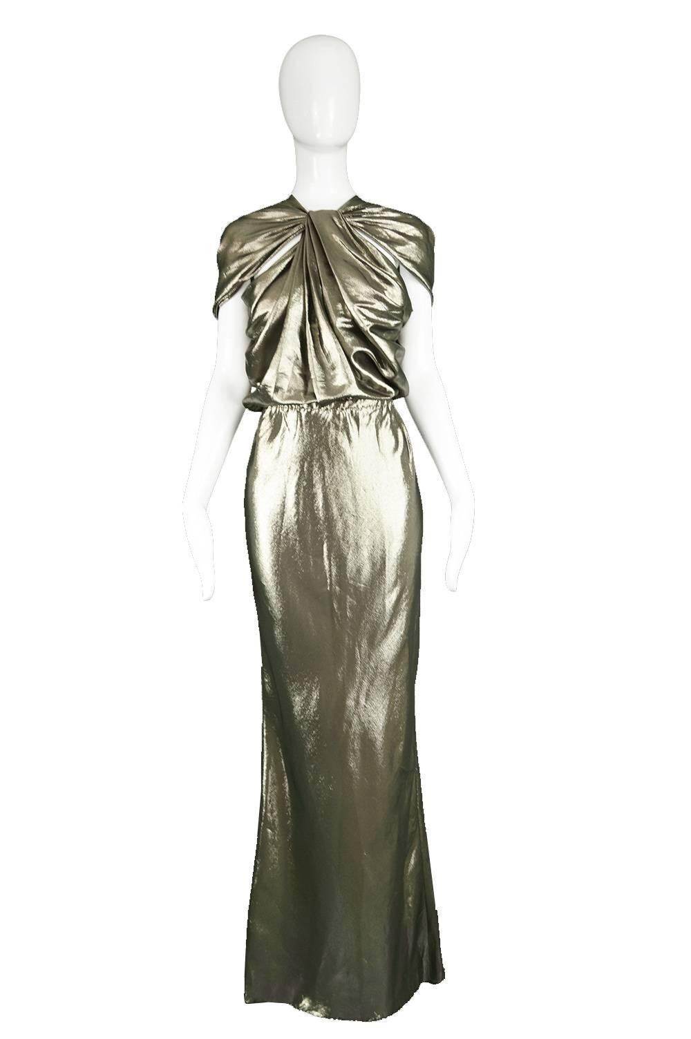 Lanvin Silk Metallic Gold Lurex Floor Length NWT Evening Gown, 2014

Size: Marked EU 40 which is roughly a UK 12/ US 8. Please check measurements
Bust - More dependent on waist due to open style
Waist - Stretches from 28-34” / 71-86cm
Hips - Up to