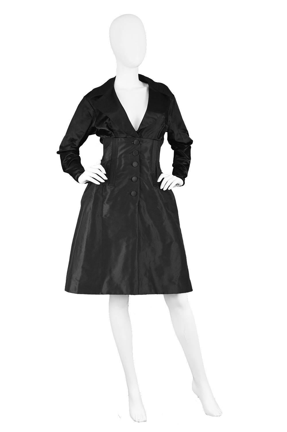 Christian Lacroix Vintage Black Duchesse Satin & Taffeta Boned Dress, 1990s

Estimated Size: UK 8/ US 4/ EU 36. Please check measurements.
Bust - 32” / 81cm
Waist - 26” / 66cm
Hips - 40” / 101cm
Length (Shoulder to Hem) - 38” / 96cm
Shoulder to