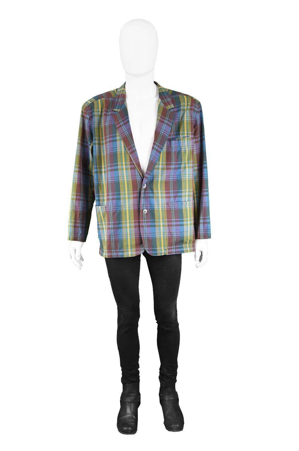 Valentino Men's Vintage Cotton Plaid Check Blazer Jacket, 1980s

Size: Marked 52 which is roughly a men's Large but has an oversized fit. Please check measurements. 
Chest - 46” / 117cm
Waist - 42” / 106cm
Length (Shoulder to Hem) - 29” /