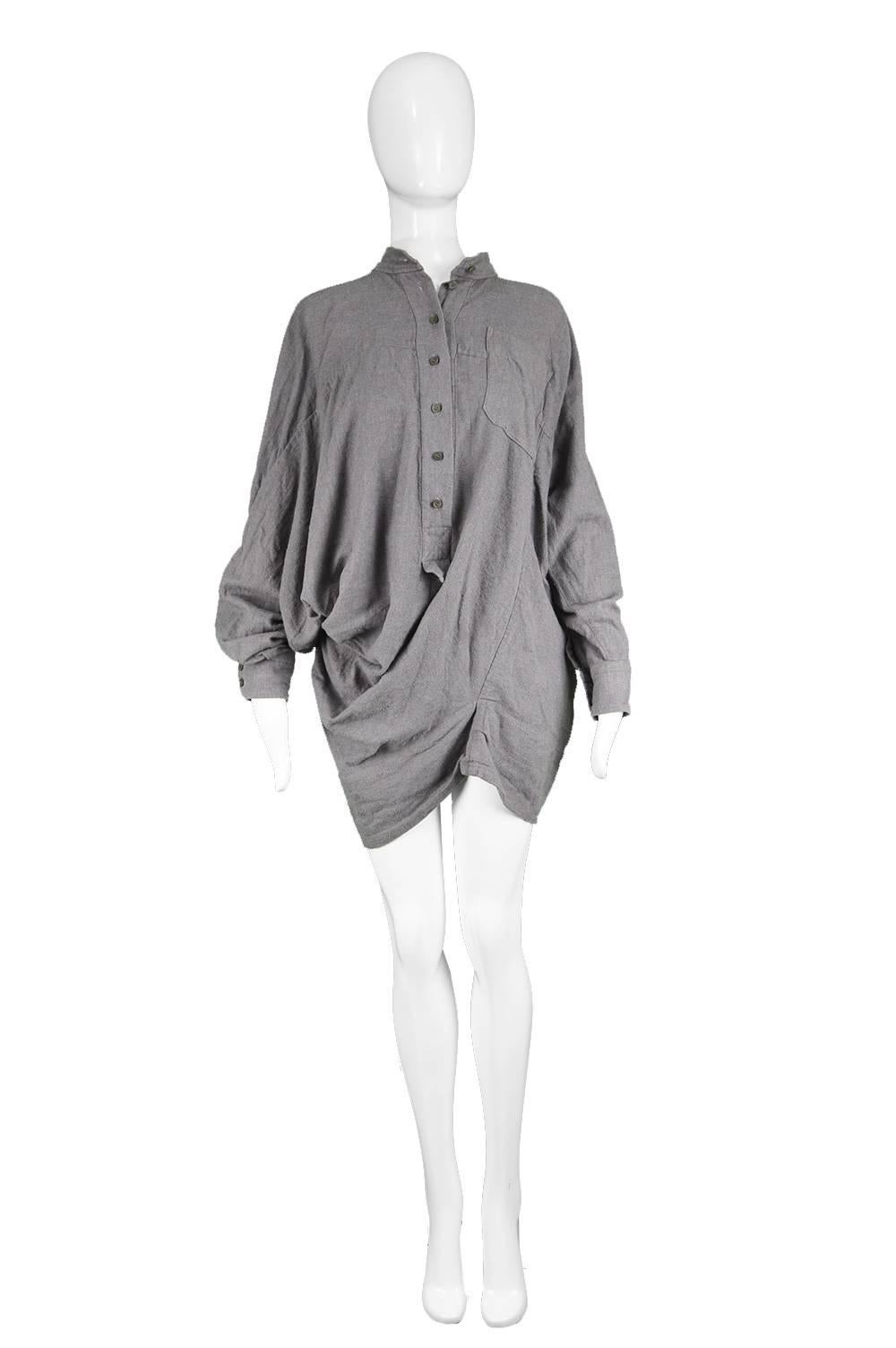 Bernard Willhelm Avant Garde Asymmetrical Draped Women's Shirtdress

Size: Best fits women's Small to Medium, as it is oversized with fitted hips.
Bust - Free due to design
Waist - Free
Hips - Up to 42” / 106cm
Length (Shoulder to Hem) - 30” /