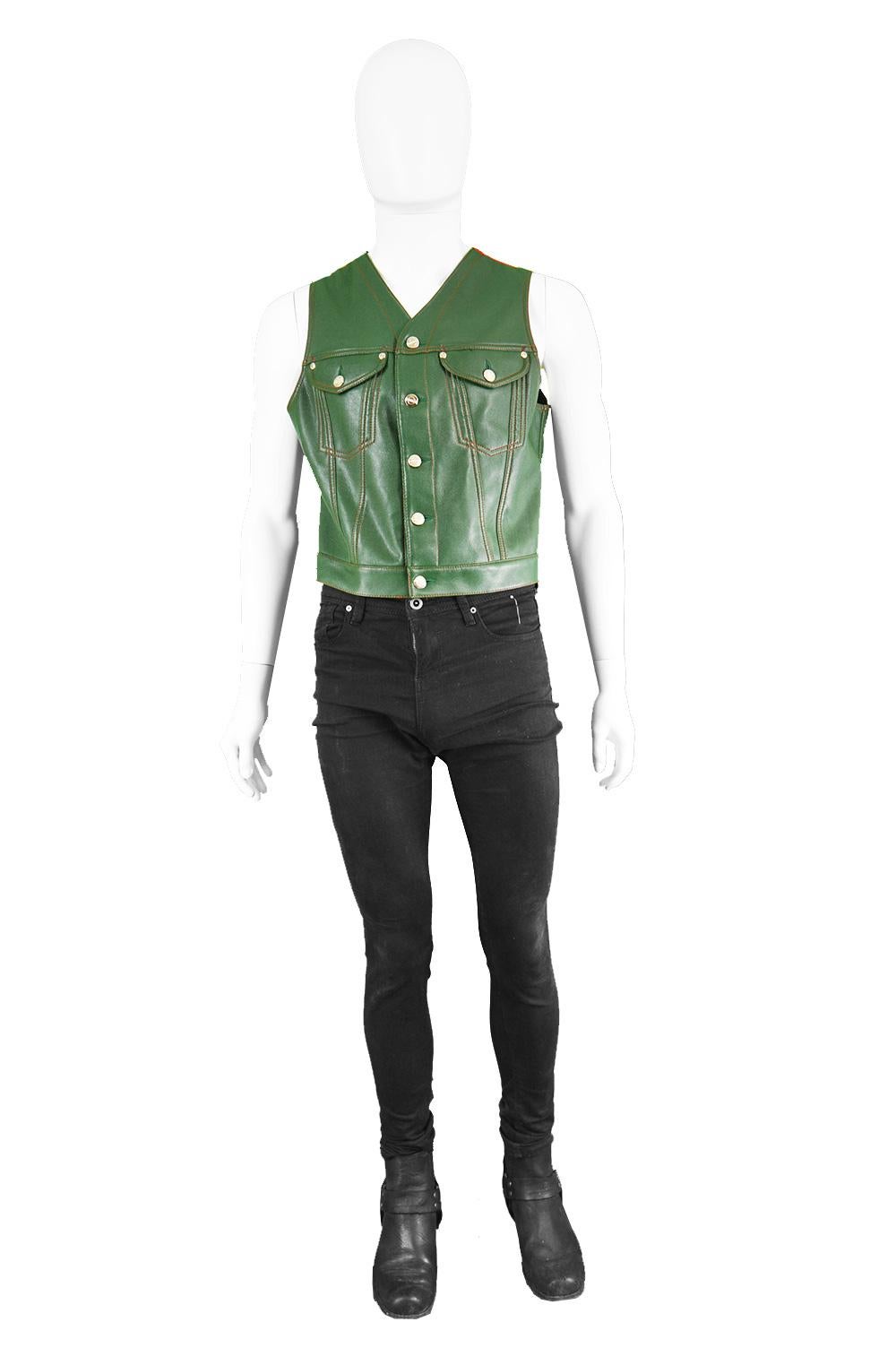 Jean Paul Gaultier Men's Green Faux Leather Gilet Vest with Red Taffeta Back, 1980s

Size: Marked 50 which is roughly a men's Small to Medium. Please check measurements.
Chest - 40” / 101cm
Waist - 34” /  86cm
Length (Shoulder to Hem) - 20” /