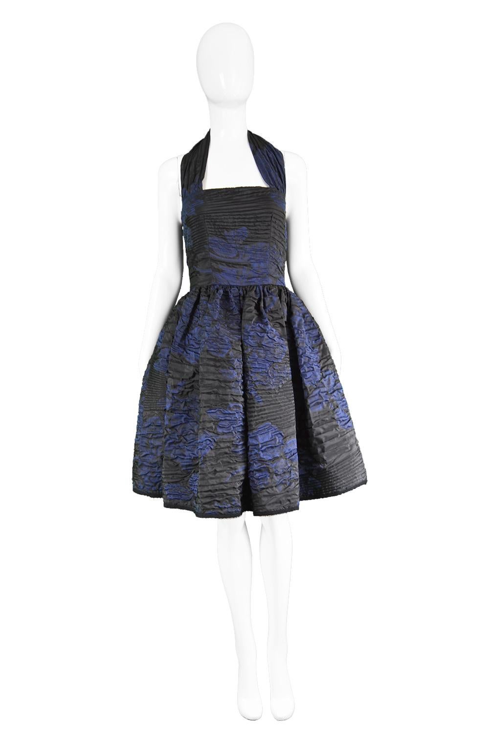 Oscar de la Renta Blue & Black Textured Silk Blend Halter neck Evening Party Dress

Size: Marked US 4 which is roughly a UK 8/ EU 36. Please check measurements.
Bust - 33” / 84cm
Waist - 26” / 66cm
Hips - Free
Length (Bust to Hem) - 31” /