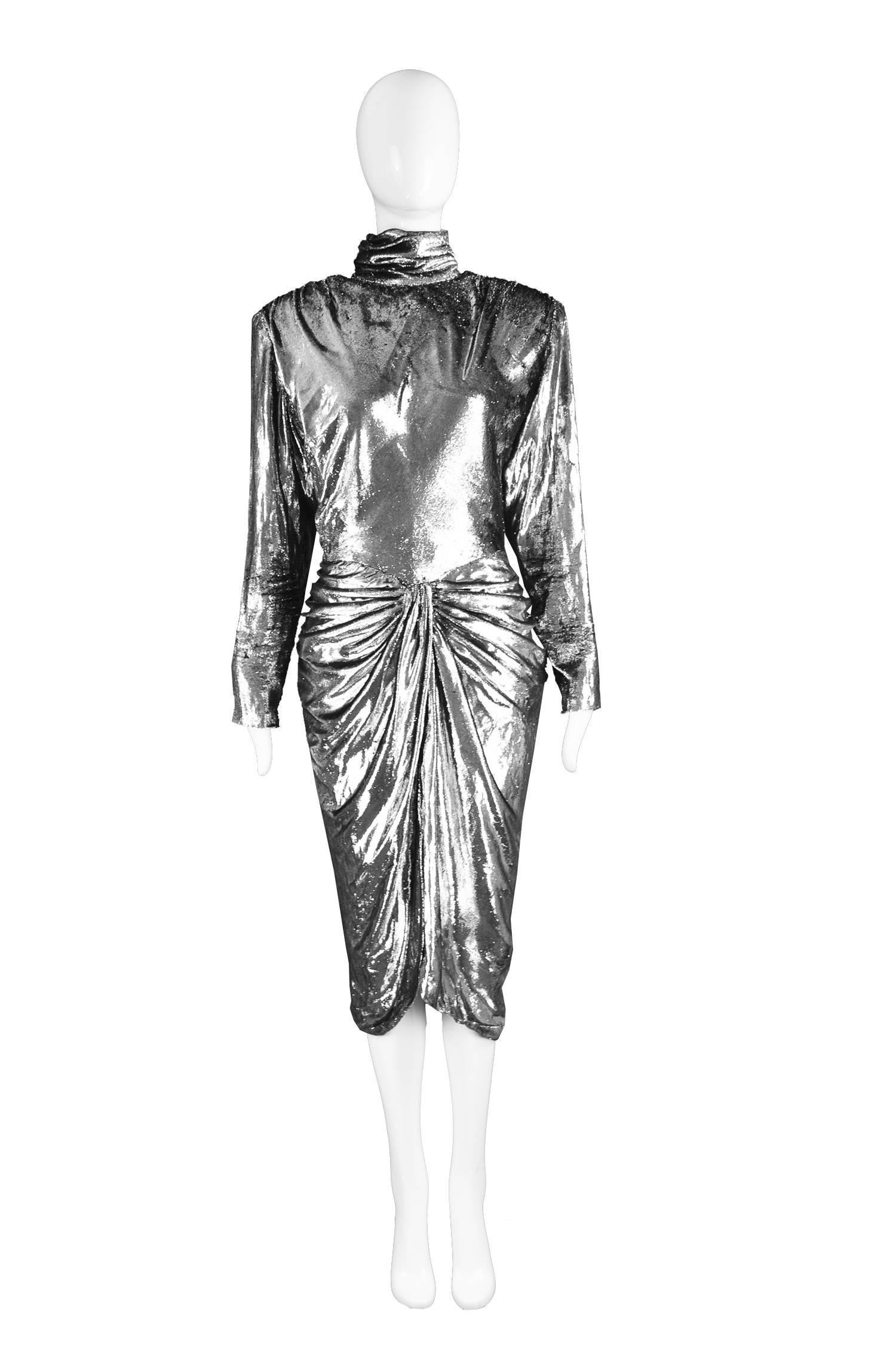Vicky Tiel Silver Lame Velvet Vintage Draped Evening Dress, 1980s

Please Click +CONTINUE READING to see measurements, description and condition.

Estimated Size: UK 12/ US 8/ EU 40. Please check measurements
Bust - up to 40” / 101cm (has a loose,