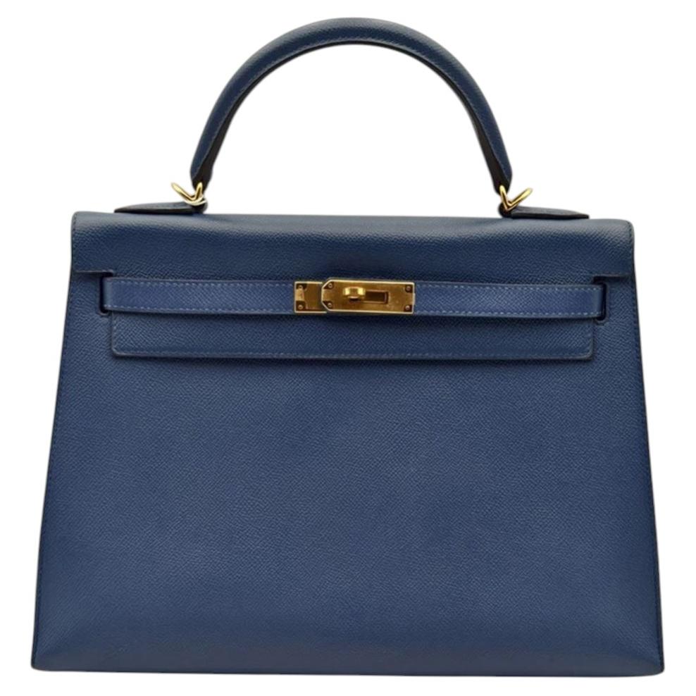Sac à main Hermès Kelly 32 en cuir Epsom bleu, poignées dorées, collection HW, 2017