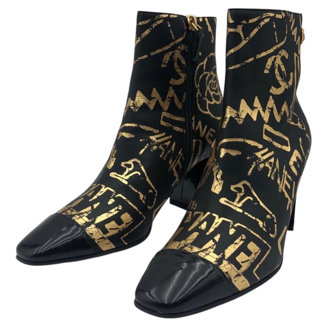 Pre-owned Chanel Paris-new York Graffiti Ankle Boots Black Gold Leather Cc Shoes Size 36.5
