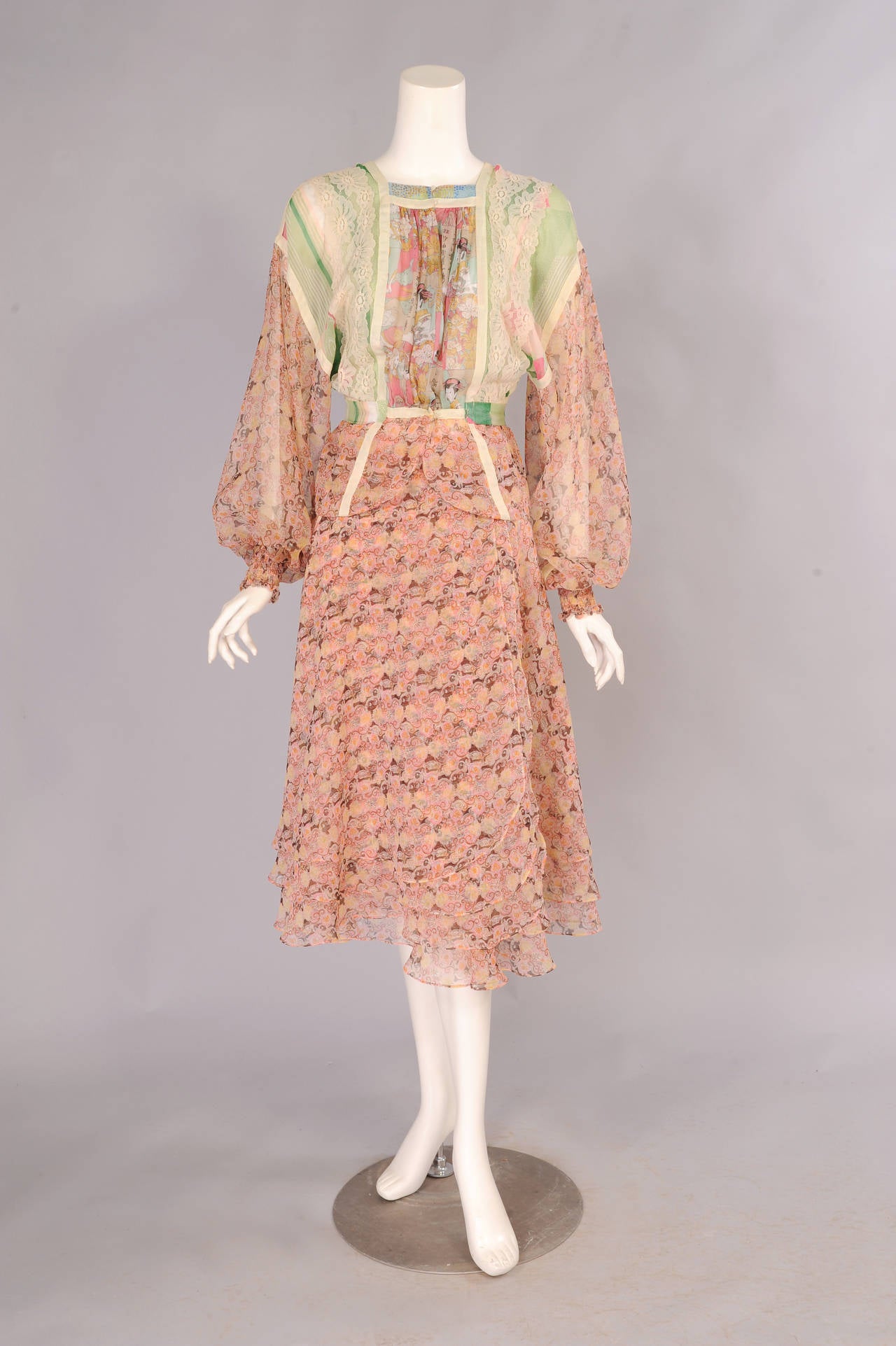 A charming combination of four printed chiffons with lace and ribbon trim is used for this ultra feminine blouse and wrap skirt designed by Koos Van Den Akker in the early 1970's. The top has a print with Japanese  ladies at the center front and