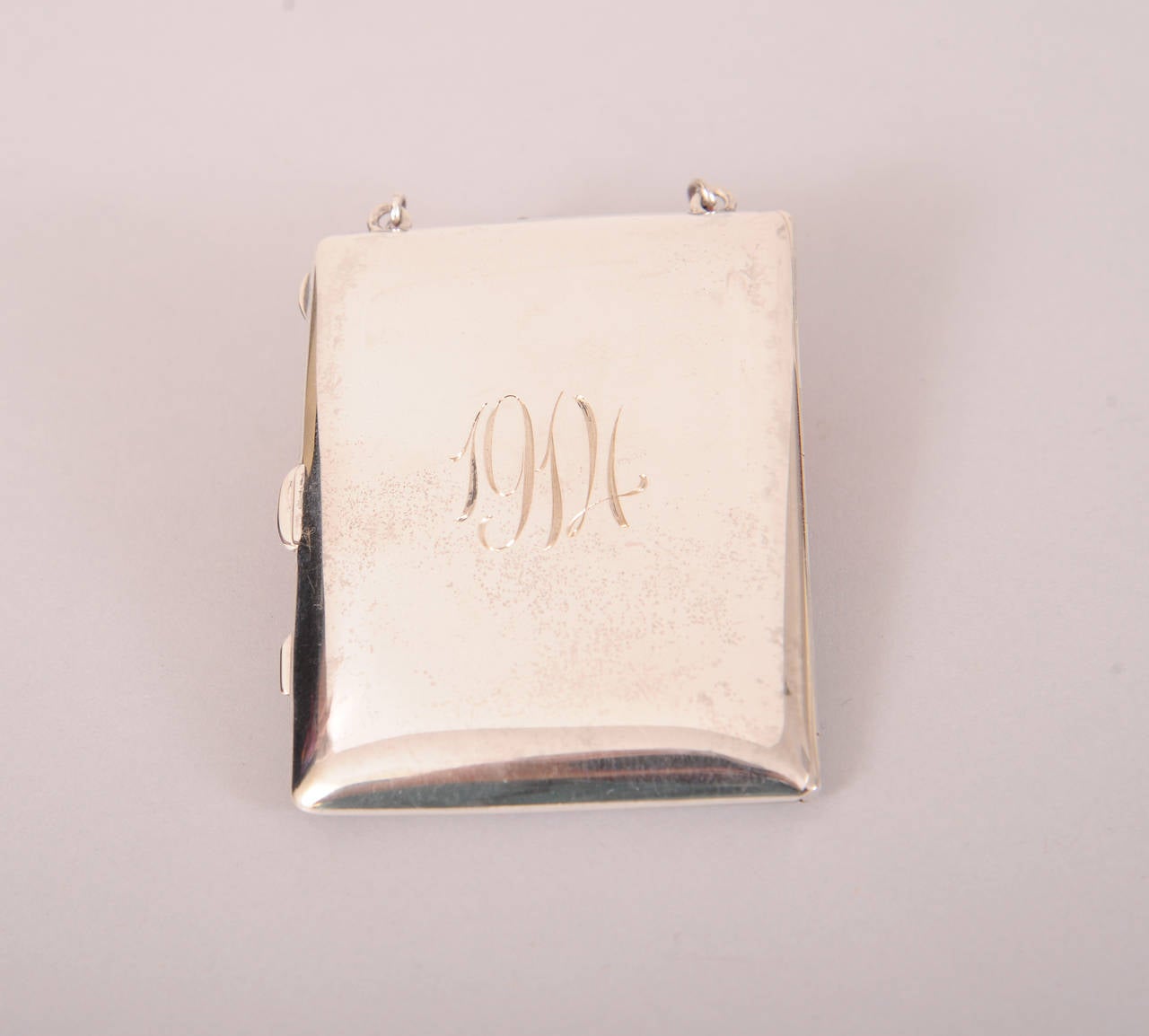 A charming Gorham & Co. sterling silver necessaire held everything a lady needed in 1914. There is a mirror and compact, a place for change and a place for folding money. It is dated 1914 on one side and monogrammed on the other.
It comes with the