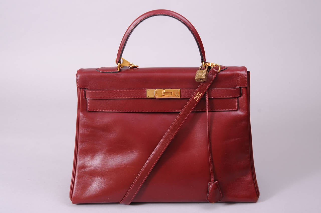 Hermes 1979 Burgundy Box Kelly Bag 35cm with Shoulder Strap In Excellent Condition In New Hope, PA