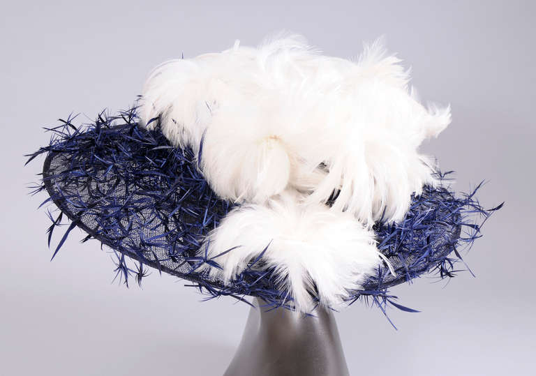 Philip Treacy is the milliner to British Royalty, no less than thirty three of his stylish and original hats were worn to the Royal Wedding of Prince William and Kate Middleton. Karl Lagerfeld is a fan of his work and asked him to design hats for