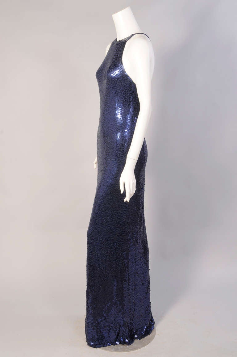 This dress is from the personal collection of Norell model and muse Denise. 
She has shared so many wonderful stories of her years working and traveling with Norman Norell. I am thrilled to be able to offer this stunning and iconic sapphire blue
