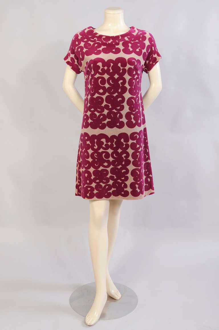 Annika Rimala designed the Tarha pattern for Marimekko in 1963. Still in use this dress is made from a cotton velour. The dress was sold at Design Research in Boston and it is in excellent condition. It comes with a matching tie belt.