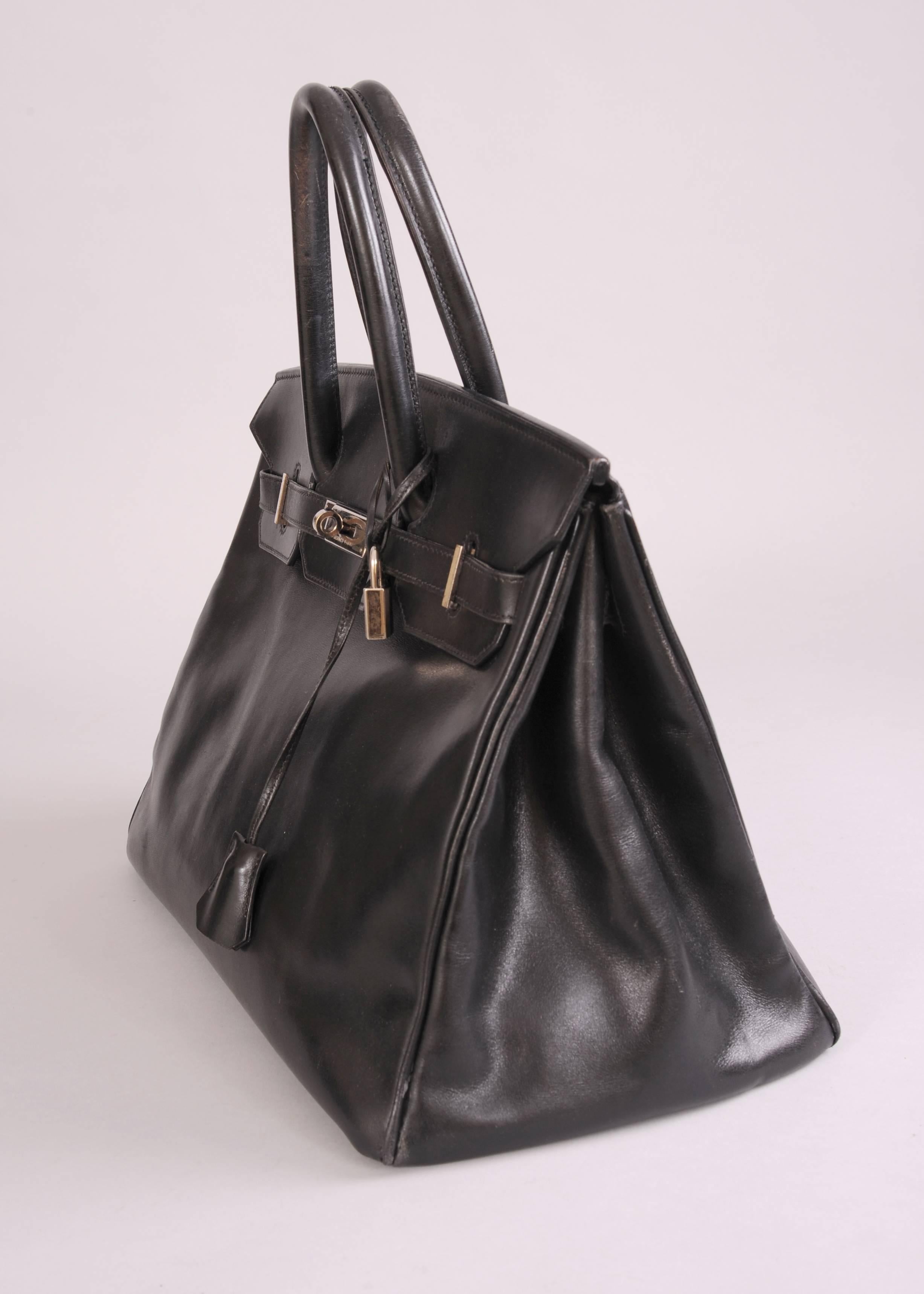 This 35 cm Birkin bag dates to 2000. It is part of a collection of handbags that I recently acquired from a fashion industry executive. The bag retains the original lock, keys, clochette and the sleeper bag. It is in great condition with normal wear