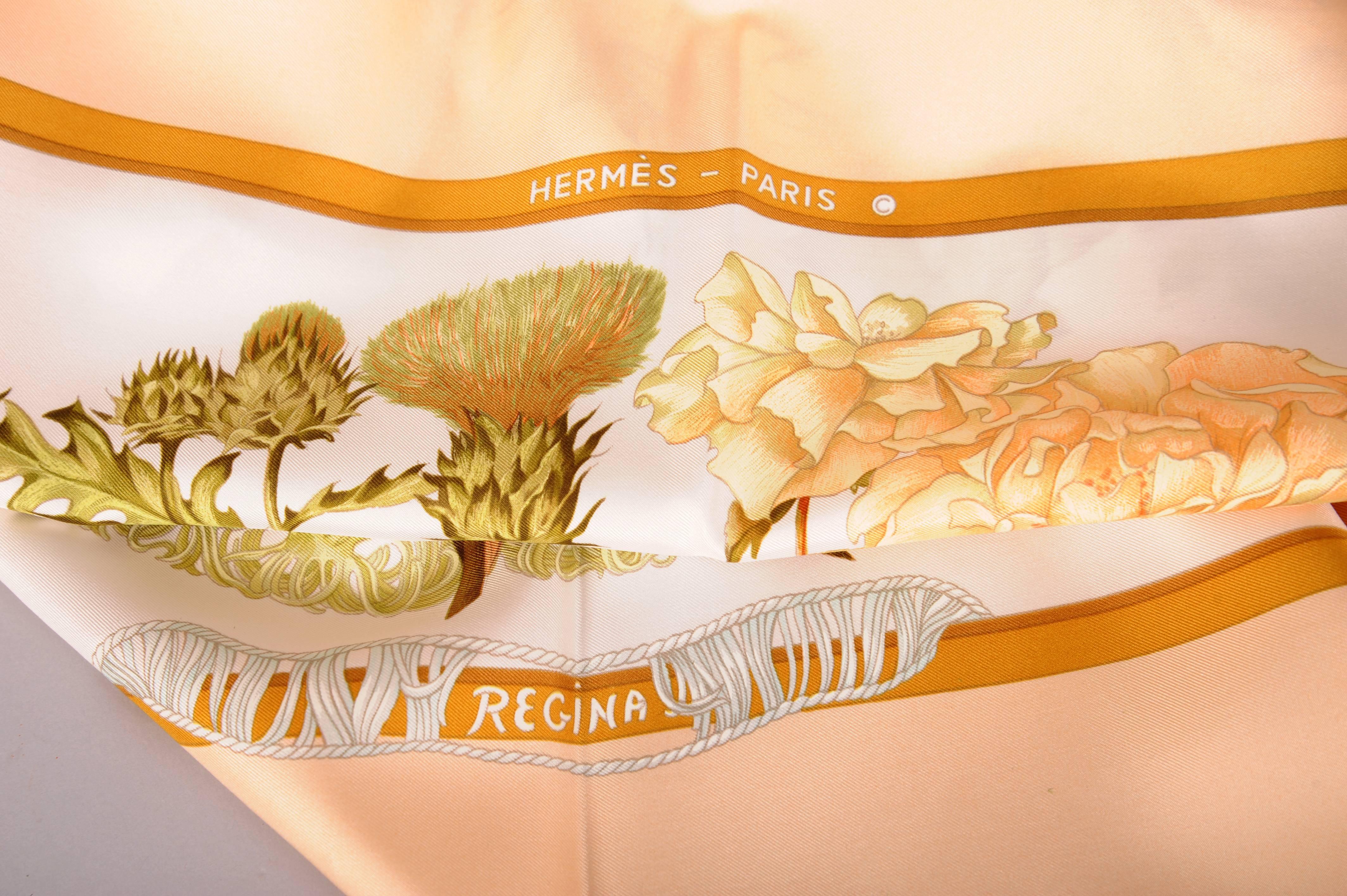 Leila Menchari, the Artistic Director of Hermes, is responsible fr many of their truly amazing window displays. She designed this scarf in shades of peach, coral and green. It is in excellent condition and comes with the original box.