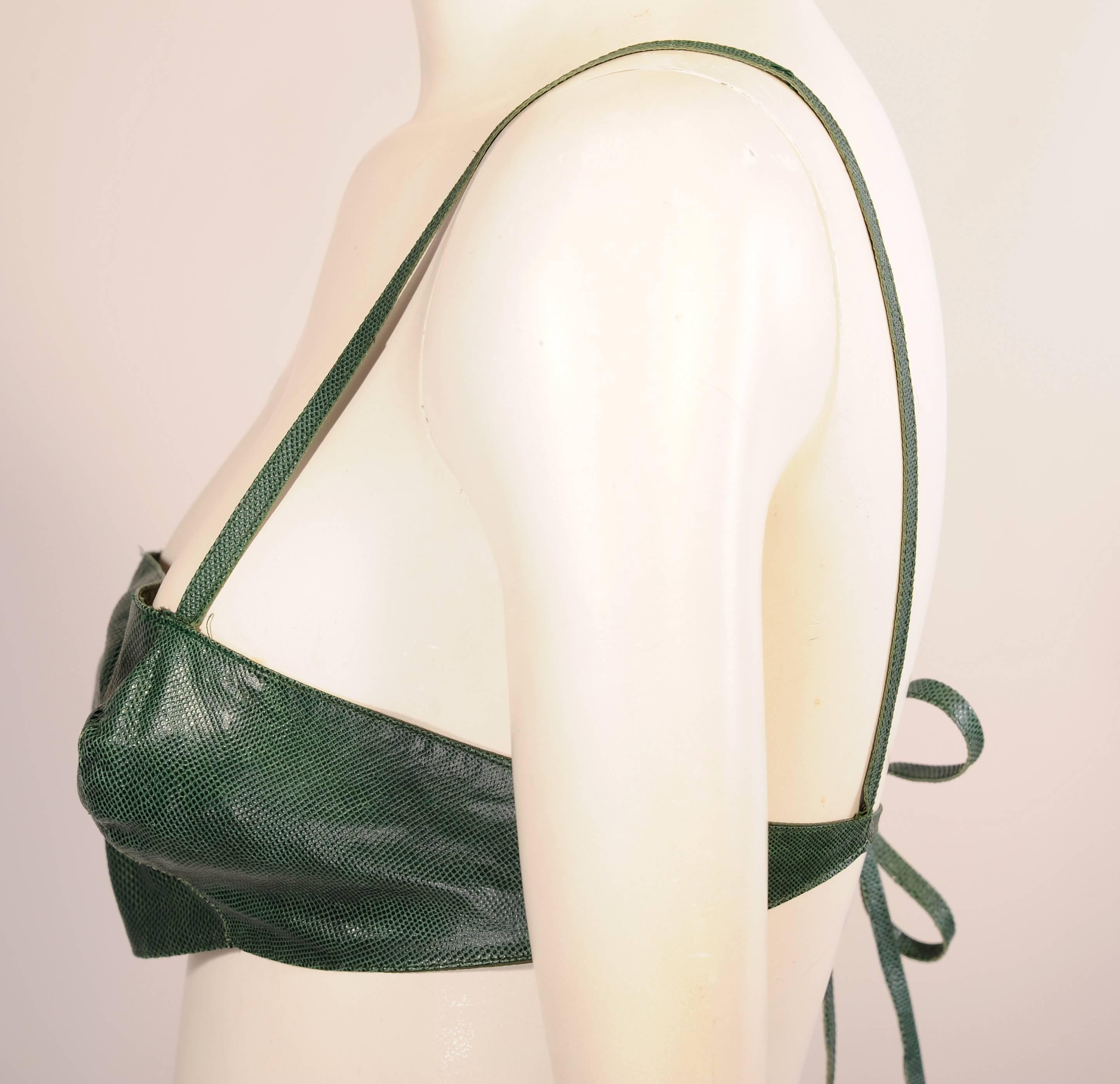 This is a fabulous little piece of 1970's dressing from same estate as the Halston jacket. A deep green Karung snakeskin is used for this bra top, the straps and the tie back. Designed by Gayle Kirkpatrick for her Atelier line it was retailed by