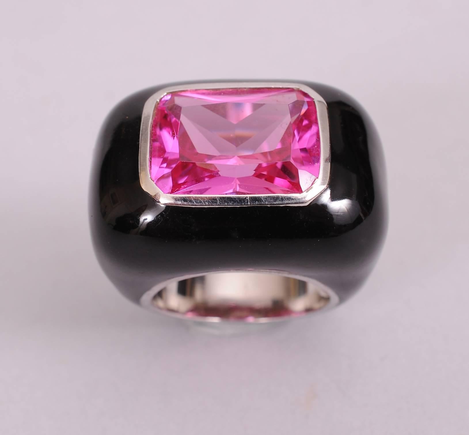 black ring with pink stone