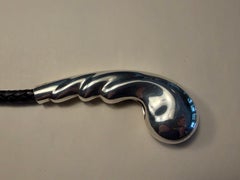 1974 Elsa Peretti Fibbia a frusta in argento sterling con cintura in pelle intrecciata