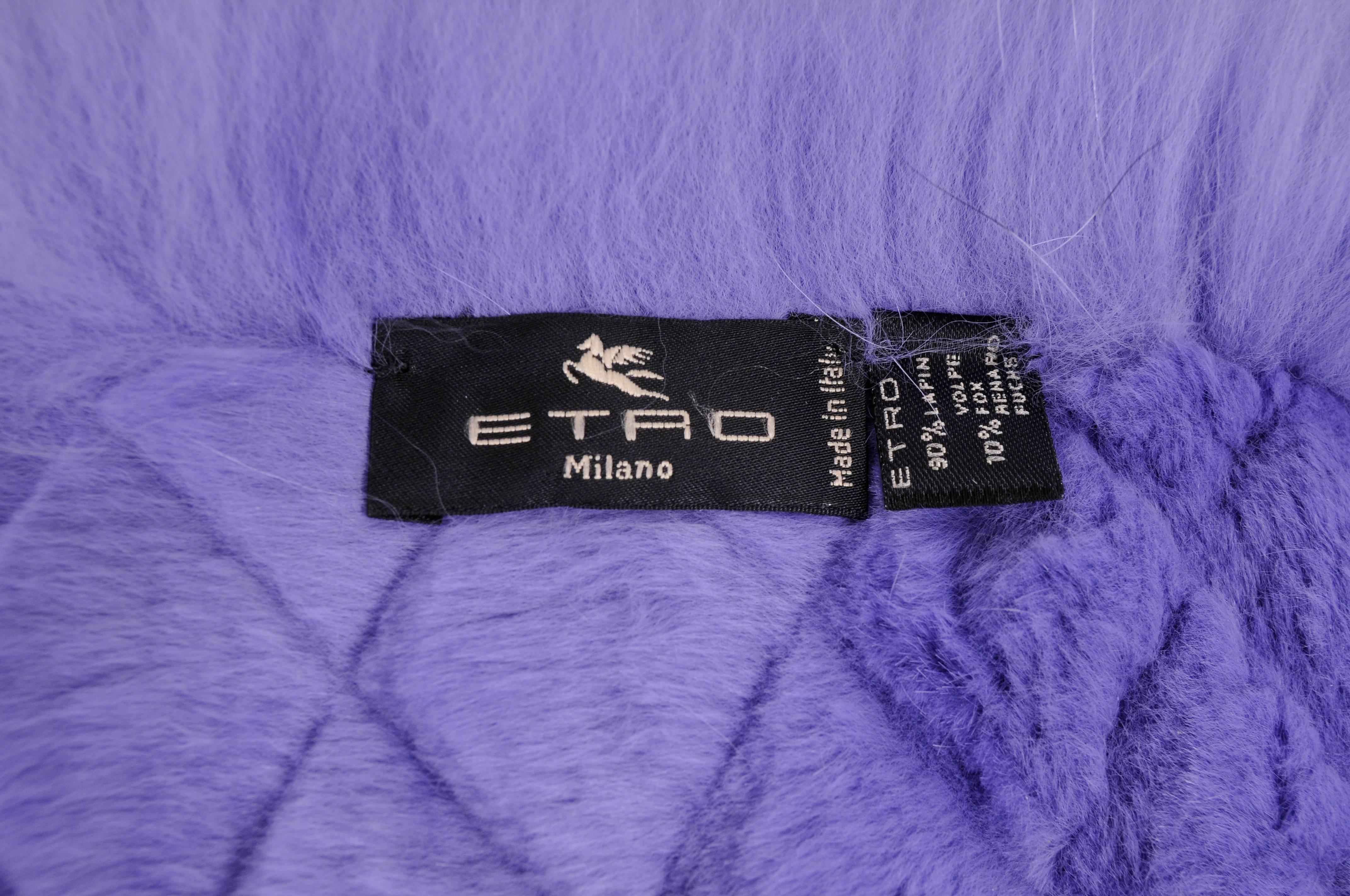 Sheared lapin, cut in a diamond pattern, is edged with matching dyed fox to create a chic neck wrap from Etro. It is in excellent condition.
Measurements;
Length 42"
Width 8"