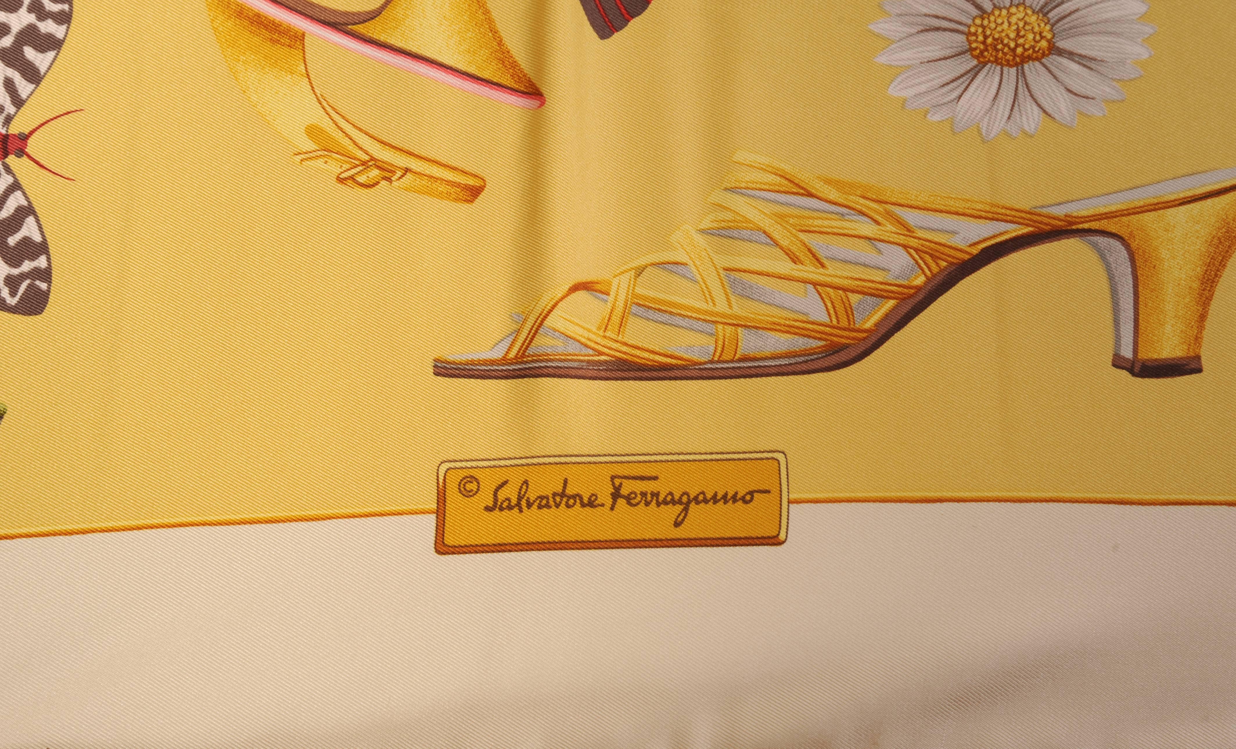 A cream border surrounds the butter yellow field of this classic Ferragamo scarf. Elegant ladies hoes in a range of styles, decades and colors are combined with daisies and butterflies for a fabulous and colorful look. This scarf would look