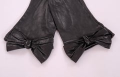Carlos Falchi Black Leather Gloves with Bow Decoration Never Worn