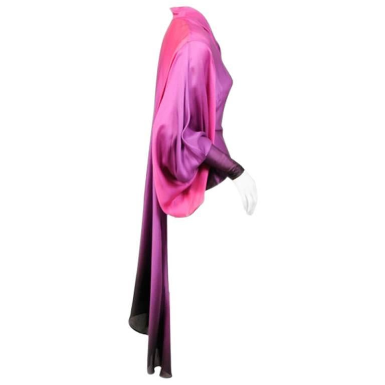 The most amazing blouse, the ombred silk is just stunning and the construction is brilliant. This blouse is a gorgeous magenta, purple, aubergine and black silk. The body of the blouse is fitted with darts and seams, and it buttons at the center