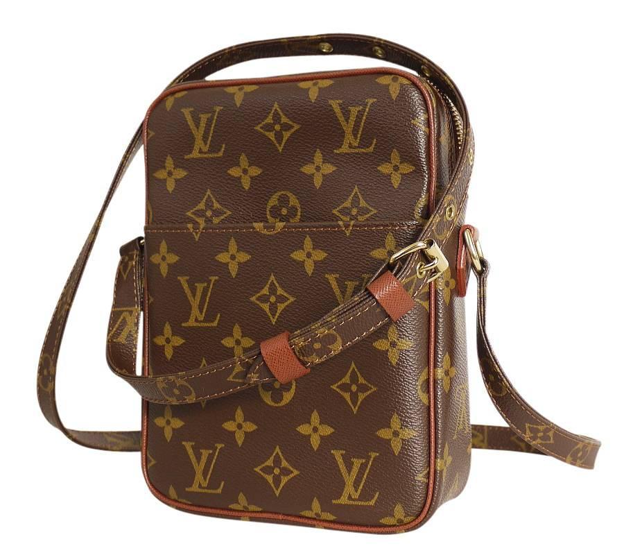 LOUIS VUITTON at COMME des GARCONS Petit Marceau, Limited Edition Cross-Body Bag. Super hard to get item. This Petit Marceau was sold at Comme des Garcons Store on Aoyama in Tokyo. Sold out in 1 day. A comfortable fit around the shoulder or across