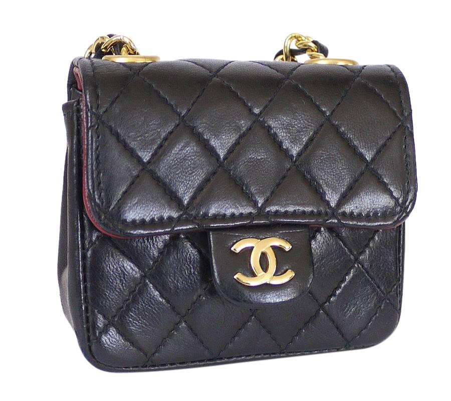 Vintage Chanel chain belt with micro mini classic. Chain belt is size adjustable and can be worn as necklace. This perfect miniature version of the original 2.55 bag is removable, and can be attached to the chain on your other Chanel handbags as bag