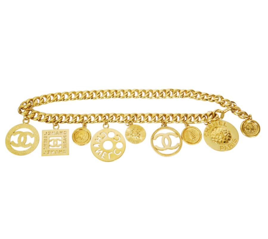 Rare Vintage Chanel big charm chain belt. Rare item from 1992 collection. Comes in original Chanel box. Big Charms dances around your hip. Wearable as necklace. Truly gorgeous.

    Material : Gold tone metal
    Comes with : Chanel