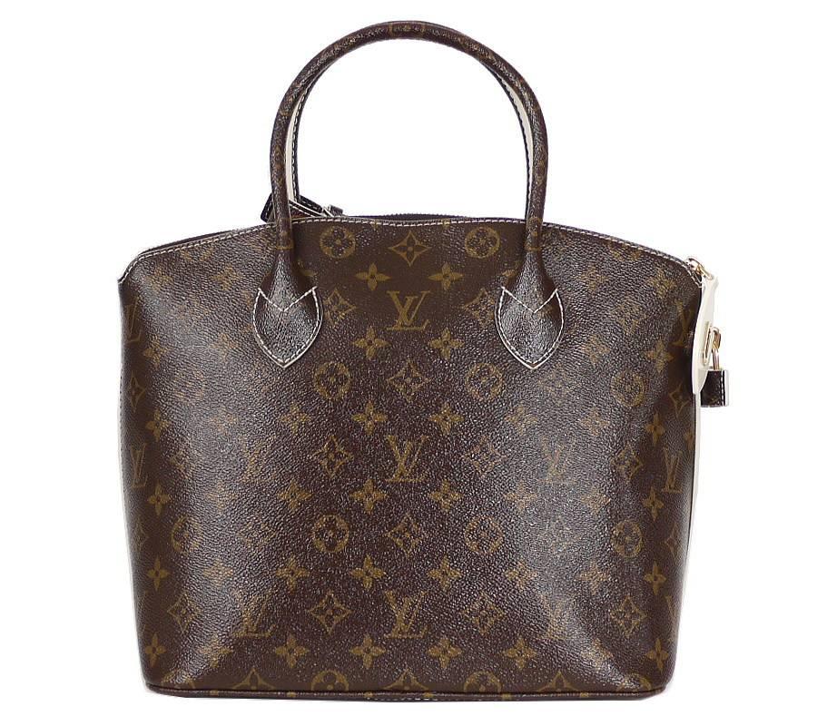 Louis Vuitton Shiny Monogram Fetish Lockit PM in great condition. The icon itself reinvented in the glossy and glamorous Monogram Fetish Canvas, but still keeping its charm and timeless silhouette. Monogram Fetish Lockit features a patent Monogram