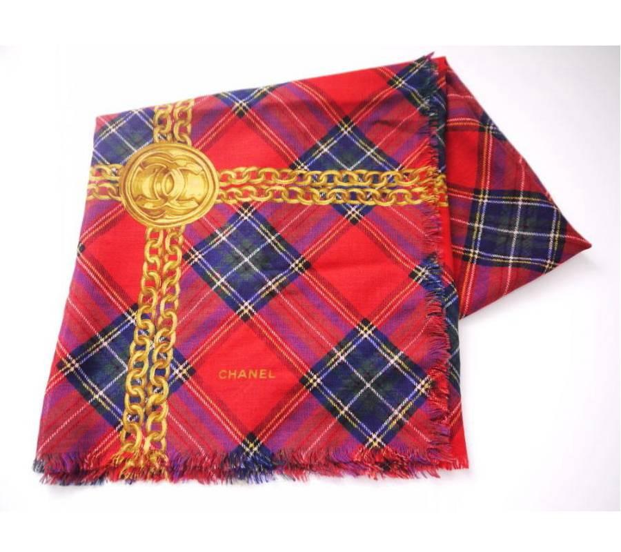  CHANEL Tartan Check Plaids Large wrap. Gold Chain is printed on the tartan. Rare CHANEL shawl kept in MINT condition. Very soft, comfortable luxury shawl. Must have item in winter. Highly recommended item.

    Main color : Red, Navy, Yellow,