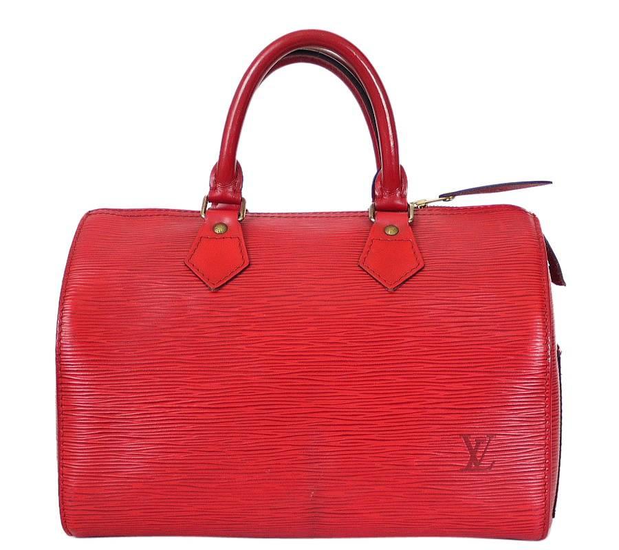 Louis Vuitton Red Epi Speedy 25 Handbag. This city bag is ideal for the fast pace of modern life. Wherever you need to go, the Speedy 25 makes zipping around town a pleasure. Looks great in gorgeous Epi leather.

    Main color and Material : Red