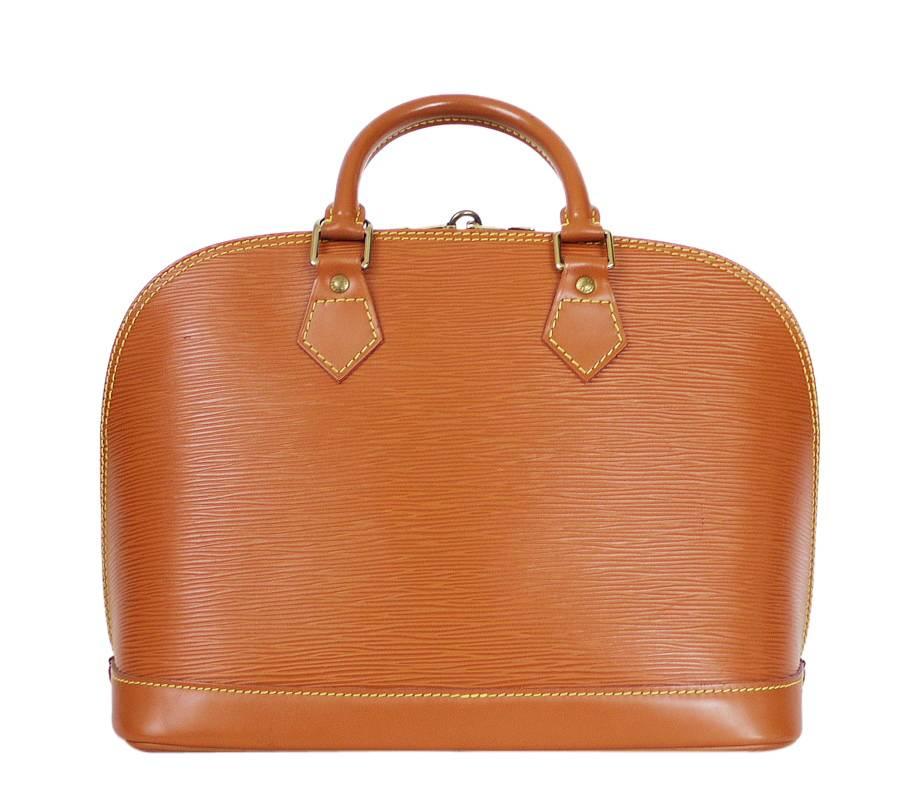 Louis Vuitton Epi Alma handbag in Zipangu Gold. Vintage LV alma handbag with brass hardware. Never out of style, Classic LV handbag.

    Color : Zipangu Gold
    Material : Epi leather
    Date Code: MI0996
    Lining : Micro fiber
    Comes