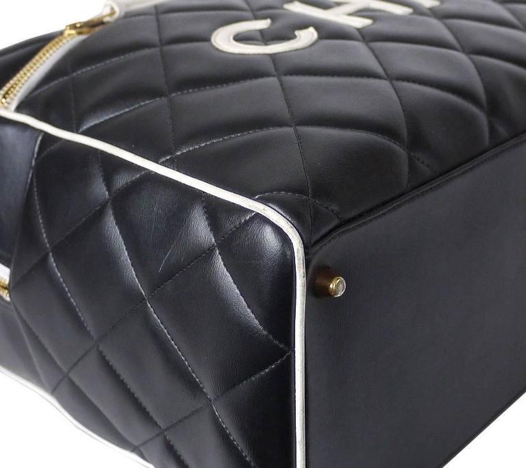 Vintage Chanel Black Leather Letter Logo Jumbo Bowling Bag at 1stDibs ...