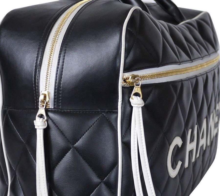 Women's or Men's Vintage Chanel Black Leather Letter Logo Jumbo Bowling Bag