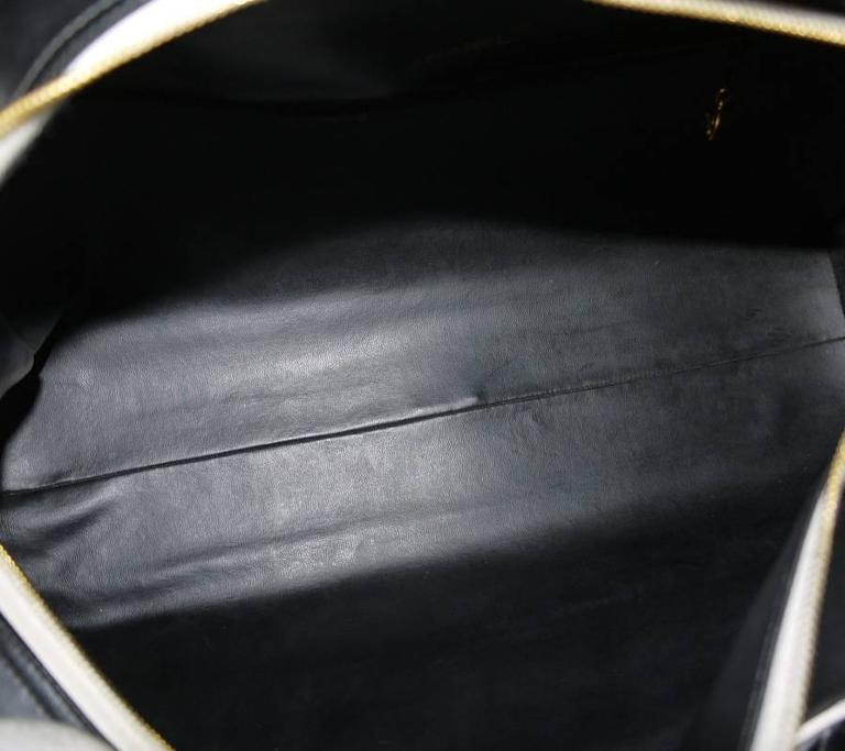 Vintage Chanel Black Leather Letter Logo Jumbo Bowling Bag at 1stDibs ...