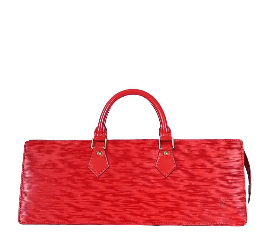 Louis Vuitton Red Epi, Sac Triangle handbag in excellent condition. Well cared, very beautiful condition. This stylish yet elegant bag is the ideal size to carry the daily essentials.

    Main color : Red
    Material : Epi leather
    Comes